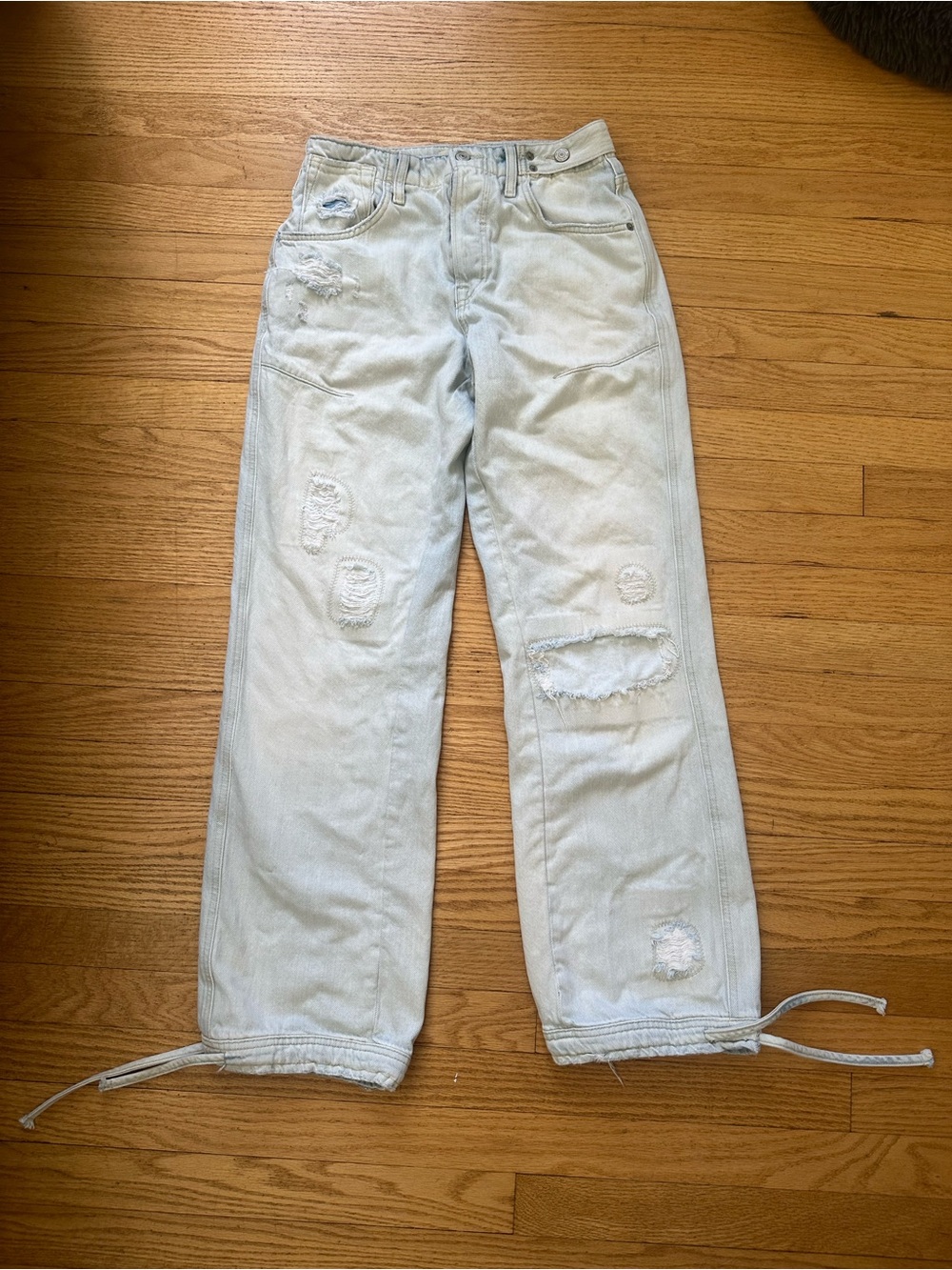 We the Free mid rise tie ankle jeans size 26